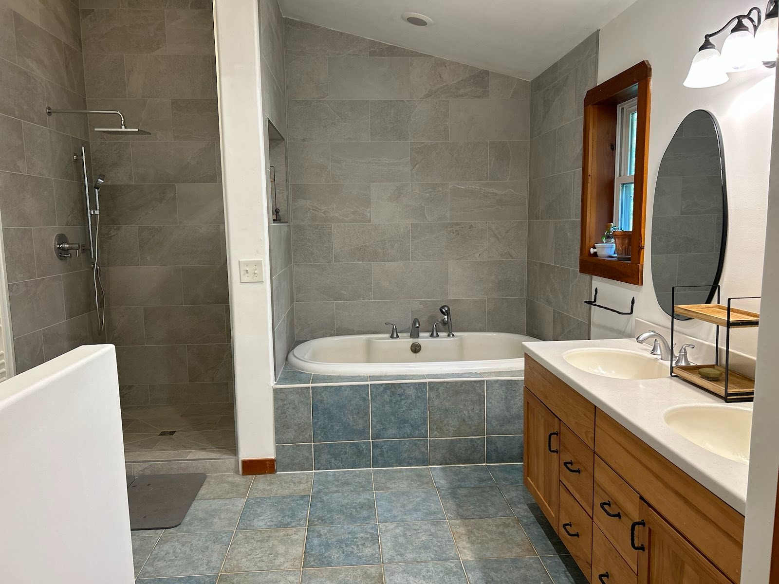 Main bathroom with large tub and separate shower.