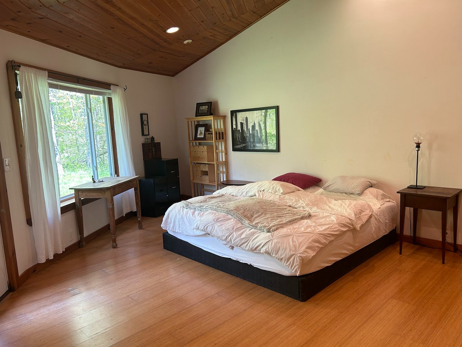 Main bedroom looking east. Because the house is domed. the ceilings range from 9 to 26 feet (2.75 to 7.9 meters).